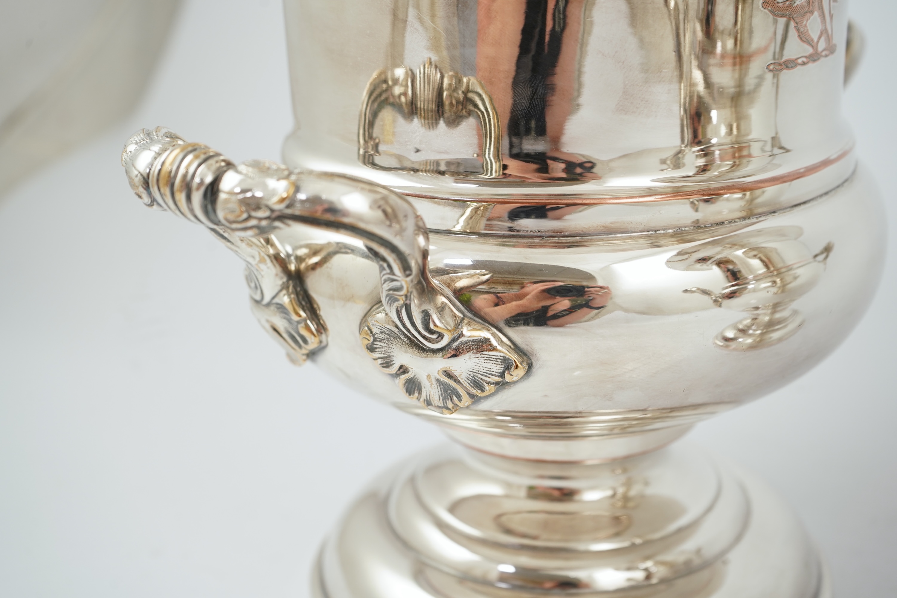 A pair of late 19th/early 20th century silver plated two handled campana shaped wine coolers, makers, FH